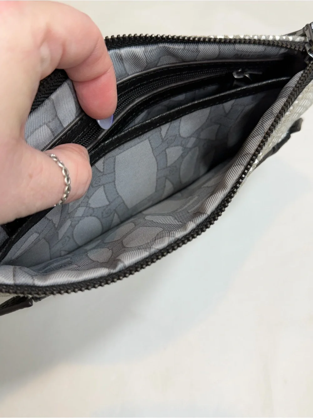 Aimee Kestenberg gray cream black leather zip top clutch